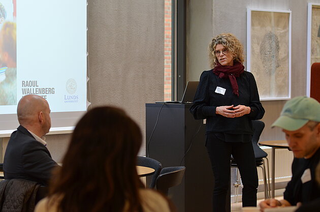 Lena Halldenius (standing)